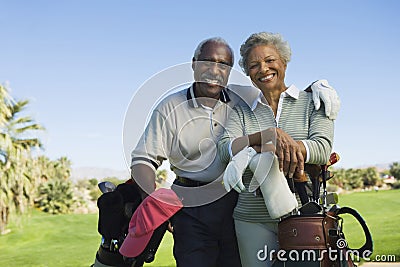 Senior Couple In Golf Course