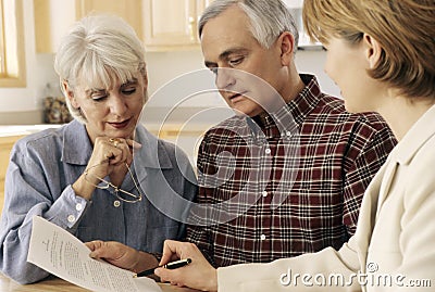 Senior couple meeting with agent