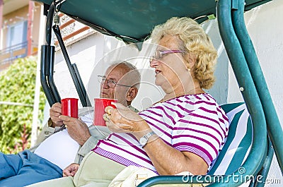 Senior Couple relaxing and drinking coffee