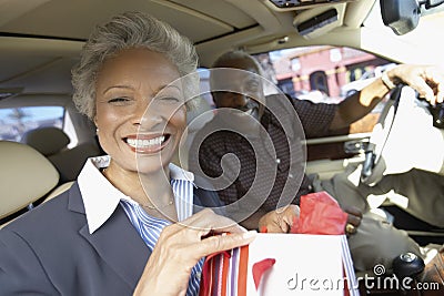 Senior Couple sitting in car, on Shopping Trip