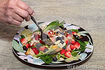 Senior Eating Salad