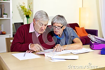 Senior family trying to do financial counts on bills