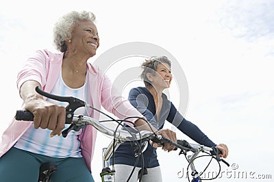 Senior Female Friends Riding Bicycles