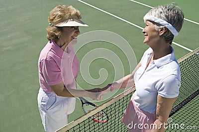 Senior Female Tennis Players Shaking Hands