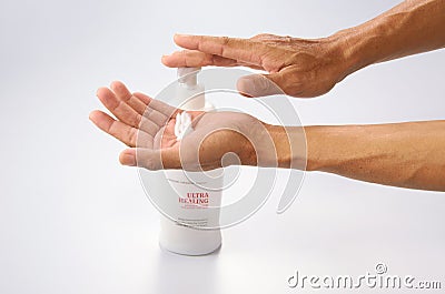 Senior Hand Applying Lotion