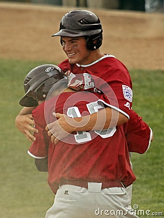 Senior league baseball world series hug