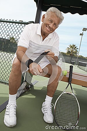 Senior Male Tennis Player Wearing Wristband