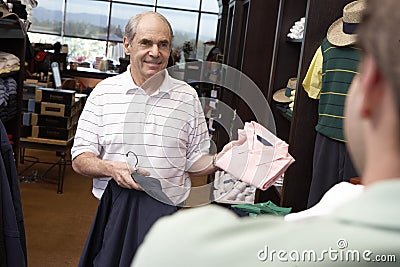 Senior Man Buying Clothes