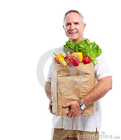 Senior man with a grocery shopping bag.