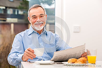 Senior man with a newspaper