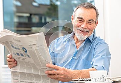 Senior man with a newspaper