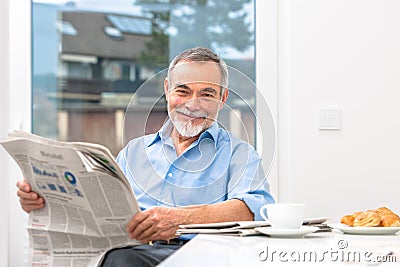 Senior man with newspaper