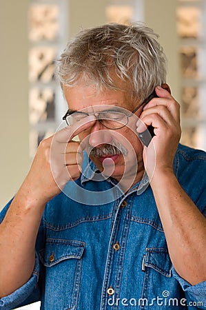 Senior man with phone