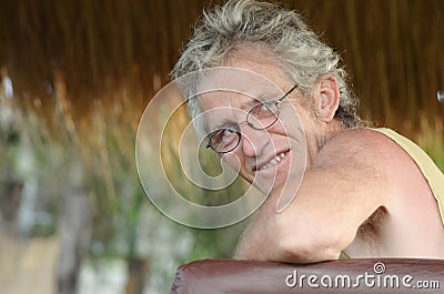 Senior mature man & spectacles relaxed smiling