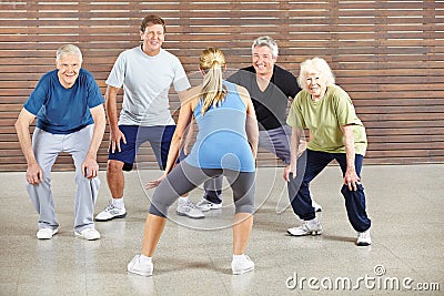 Senior people dancing to music