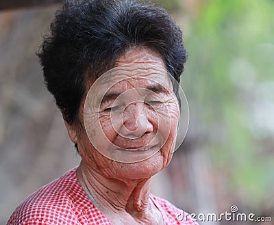 Senior people portrait, happy old woman smiling