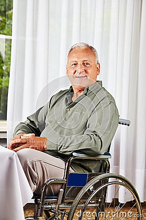 Senior in wheelchair in nursing