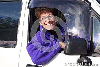 Senior woman in car