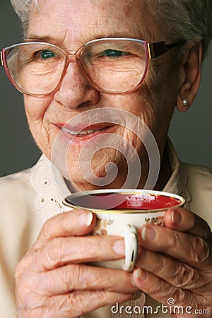 Senior woman and cup of tea