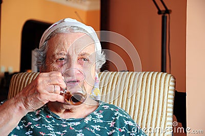 Senior woman drinking