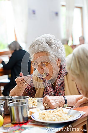 Senior woman eating