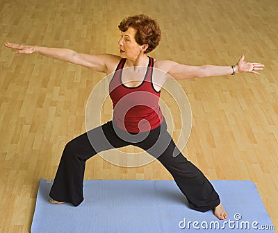 Senior woman exercising yoga