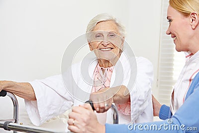 Senior woman with geriatric nurse