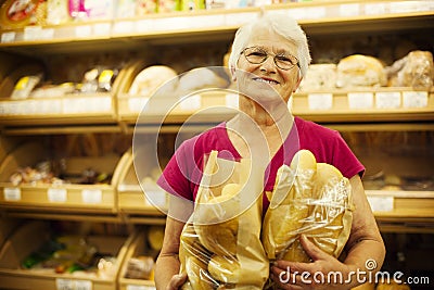 Senior woman in groceries store