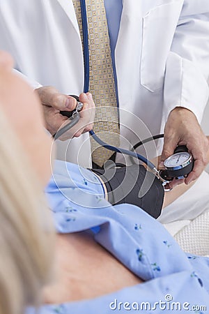 pressure blood senior having taken woman royalty patient doctor hospital male bed
