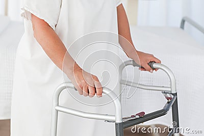 Senior woman with her zimmer frame