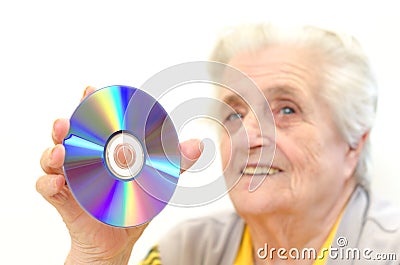 Senior woman holding dvd