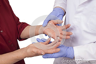 Senior woman with Rheumatoid arthritis visit a doctor