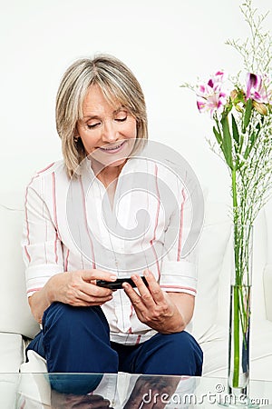 Senior woman with smartphone