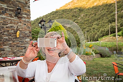 Senior woman with smartphone