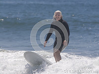 Senior Woman Surfing