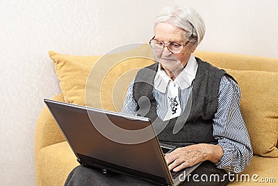 Senior woman using laptop computer