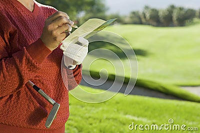 Senior Woman Writing Golf Score