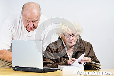 Seniors with laptop