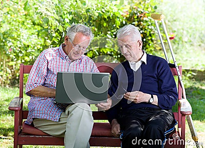 Seniors with laptop