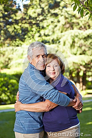 Seniors in love in a summer park