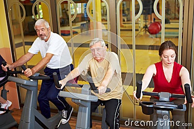 Seniors on spinning bikes