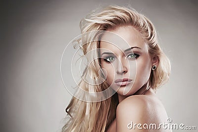 Sensitive Beautiful blond woman.hairstyle.salon care.sexy young girl. close-up portrait. green eyes