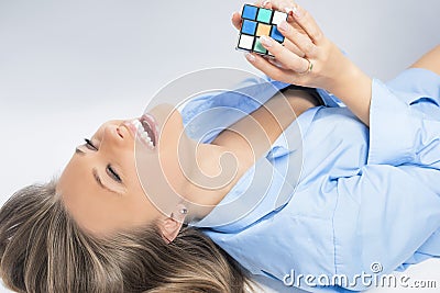 Sensual Blond Woman Playing With Cube
