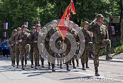Serbian army guards with guards with flag