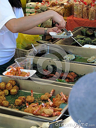 Serving fish @ Thai festival