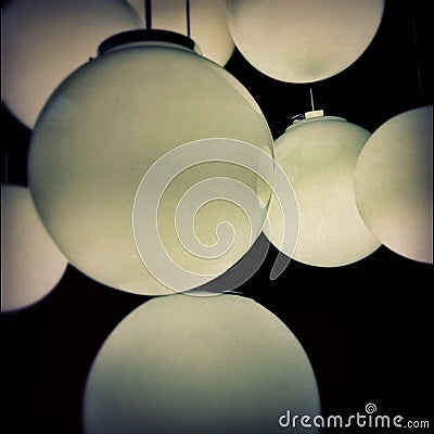 A set of nice lamps against the dark ceiling
