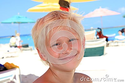 Seven year old blonde boy at the beach