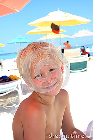 Seven year old blonde boy at the beach