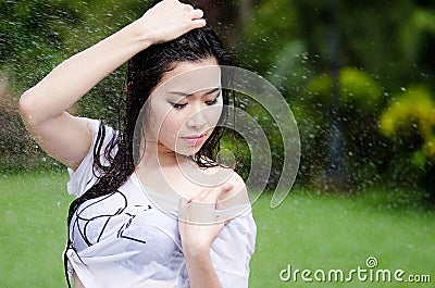 Sexy Asian girl is getting wet
