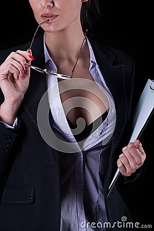 Sexy businesswoman with unbuttoned shirt